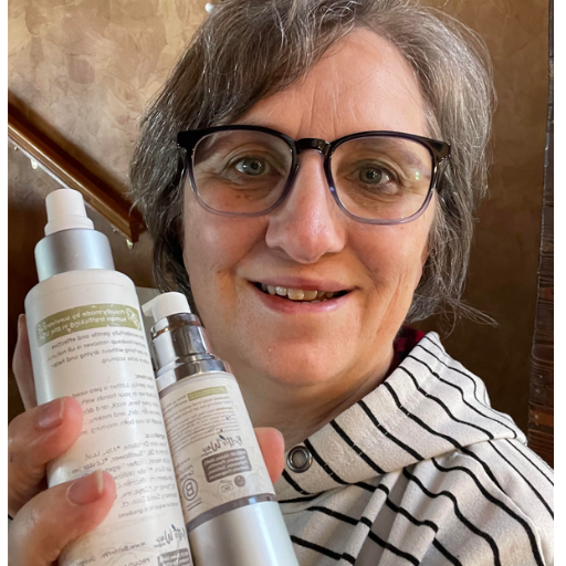 person holding skincare